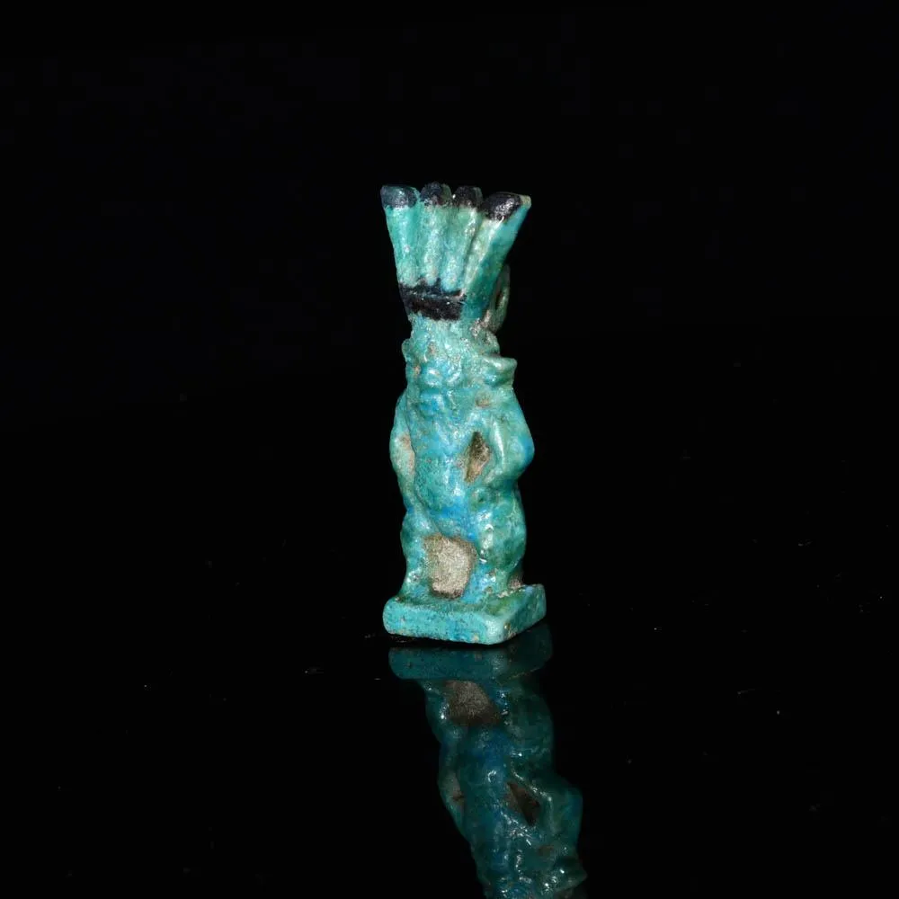 An Egyptian Faience Amulet of Bes, Third Intermediate Period - Late Period, ca. 1069 - 332 BCE