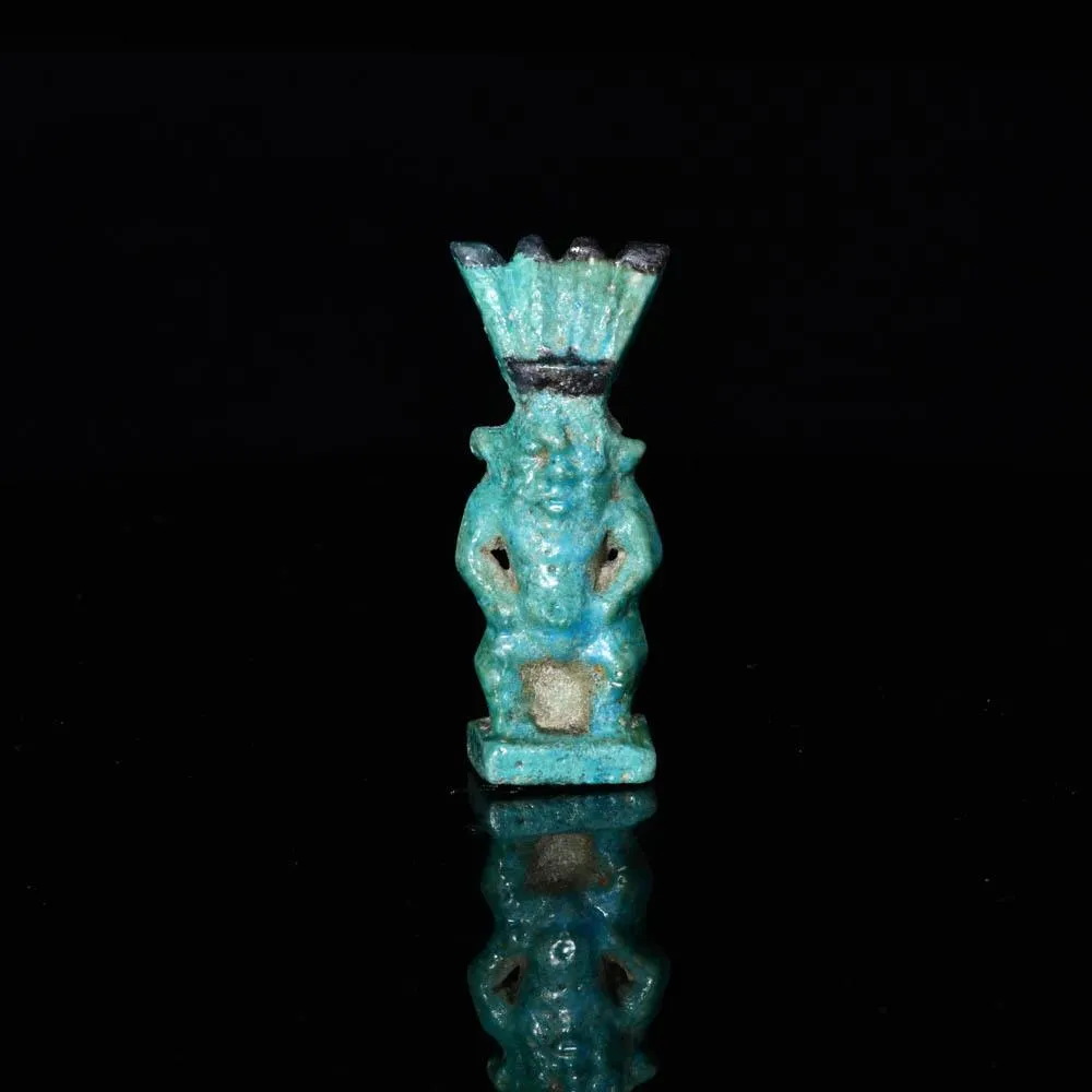 An Egyptian Faience Amulet of Bes, Third Intermediate Period - Late Period, ca. 1069 - 332 BCE